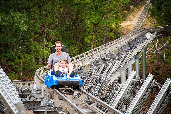 The Runaway Mountain Coaster at Branson Mountain Adventure Park offers a unique Alpine coaster experience that twists and turns through the Ozark forests and mountains