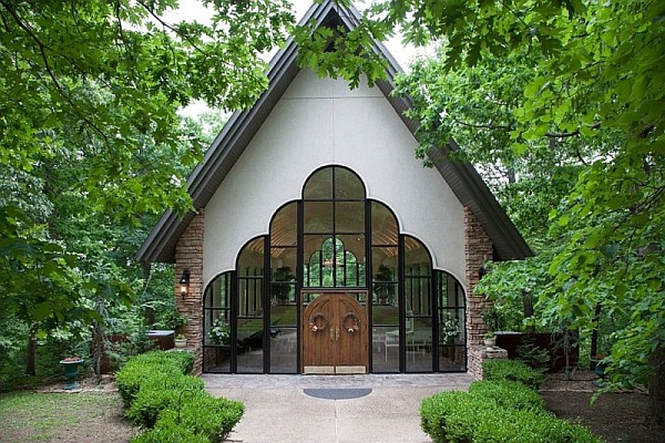 Stonegate Glass Chapel offers one of the most beautiful settings in the Ozarks for a wedding.